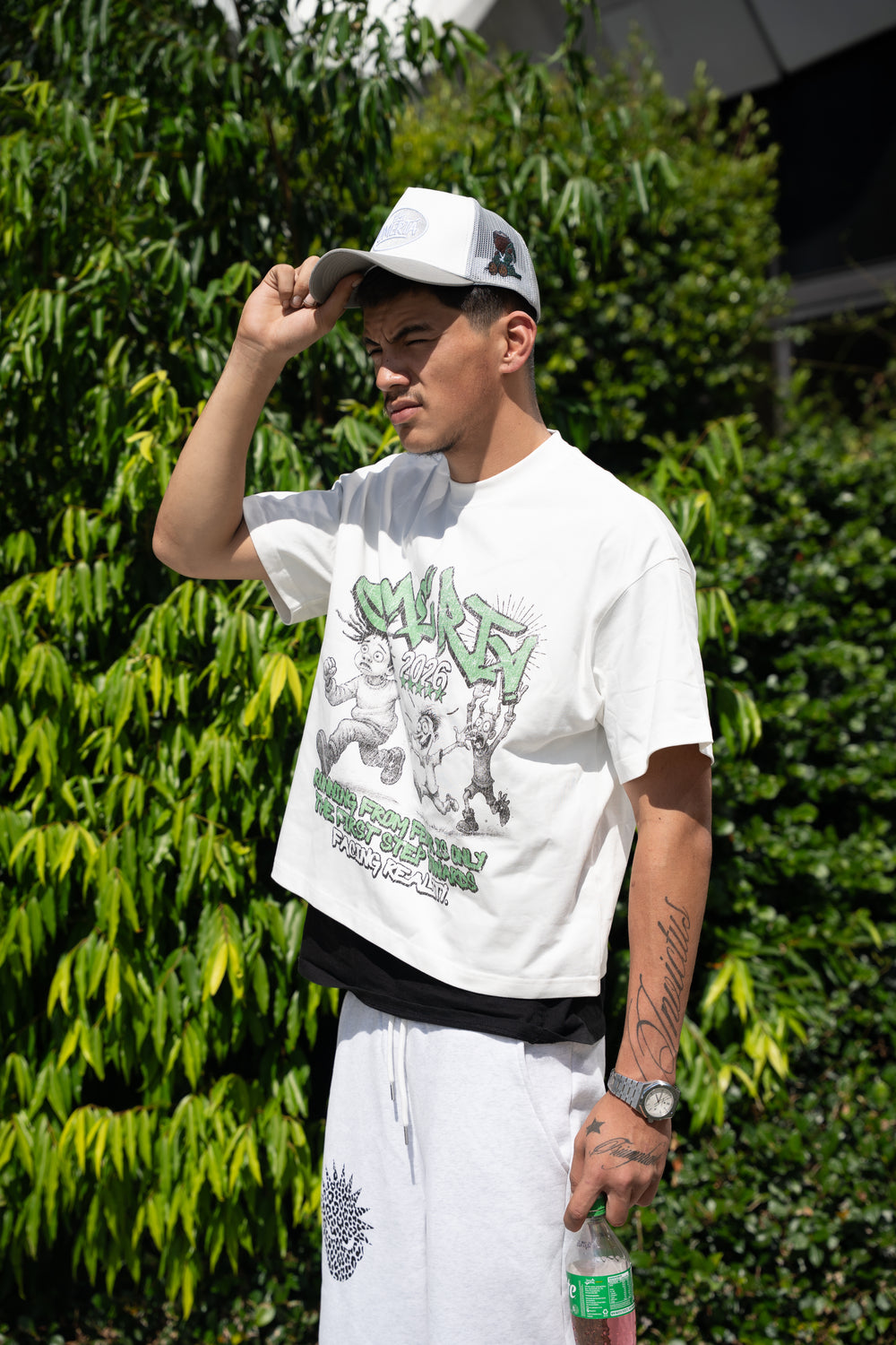 'FACING REALITY' BOX FIT TEE worn
